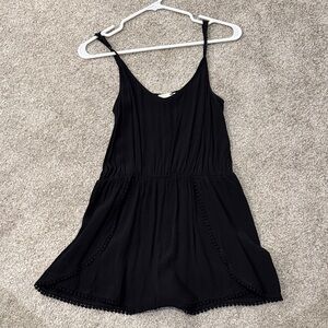 Black Sleeveless Romper with Pom-Pom Trim